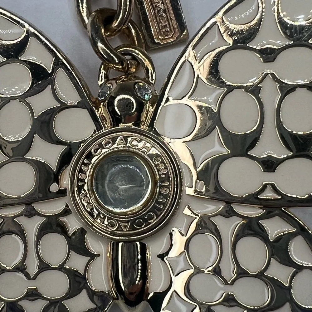 Coach Butterfly White and Gold Enamel Metal Keychain Fob Charm Rare